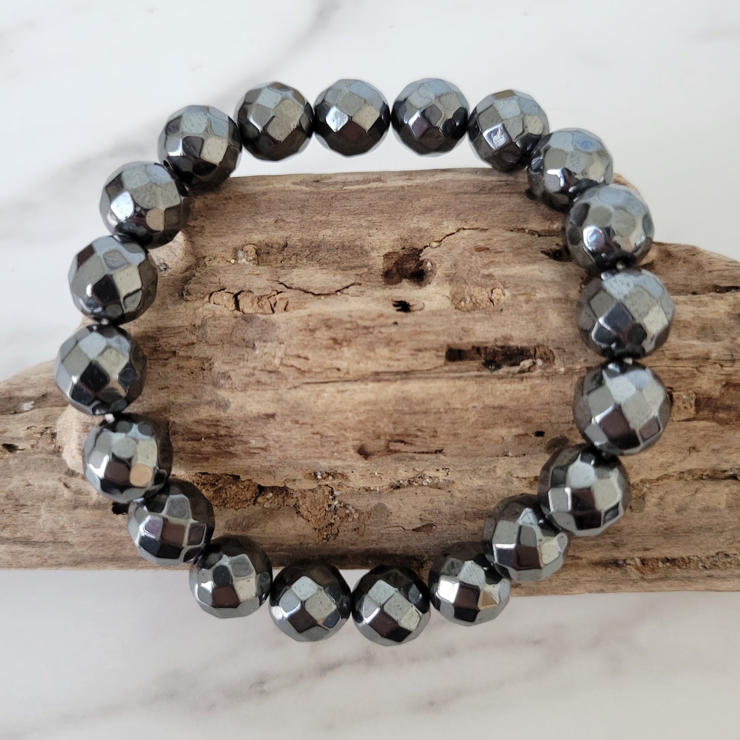 MENS 10MM FACETED HEMATITE